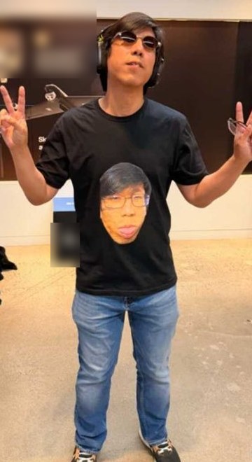 Vincent, wearing a T-shirt with Vincent on it